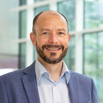 Dr. Adrian Spillmann
